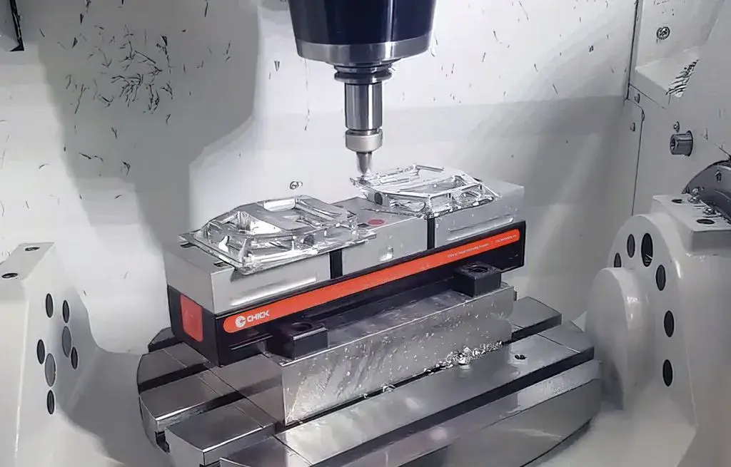 Dovetail fixture gripping the bottom of a blank for 5-axis machining